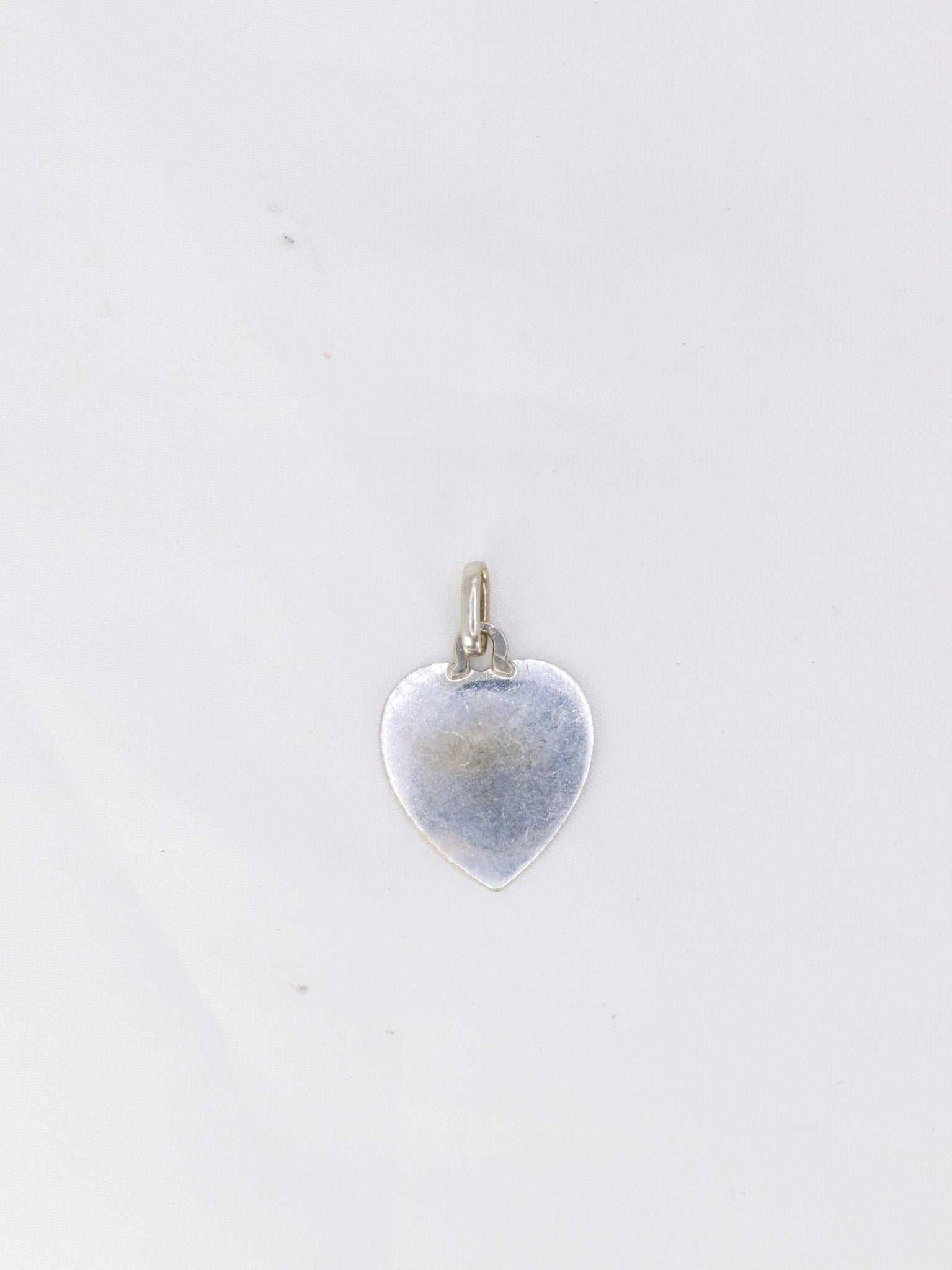 Augis love heart medal in white gold, More than yesterday, less than tomorrow