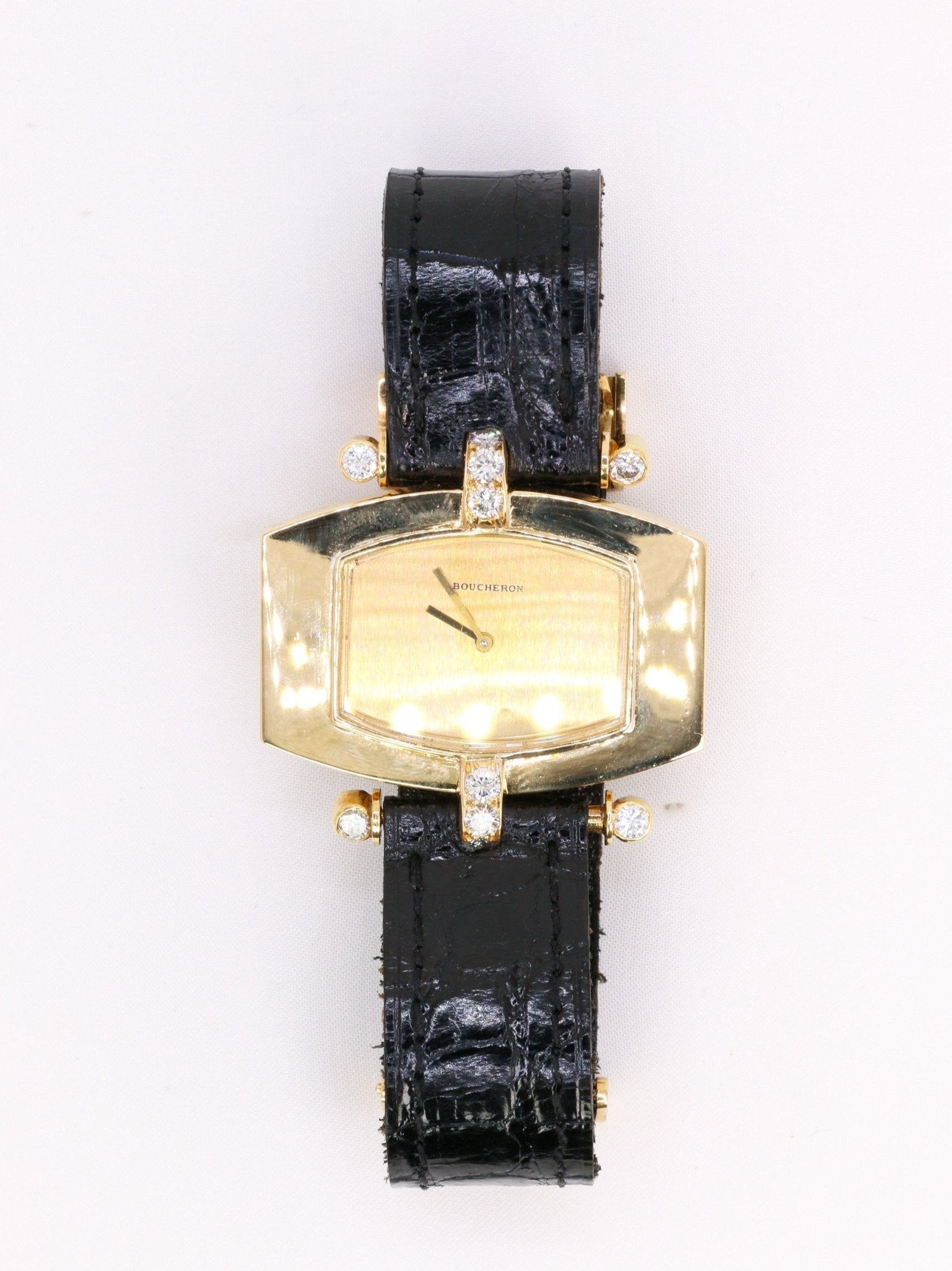 Montre BOUCHERON or jaune diamants cuir noir 1970