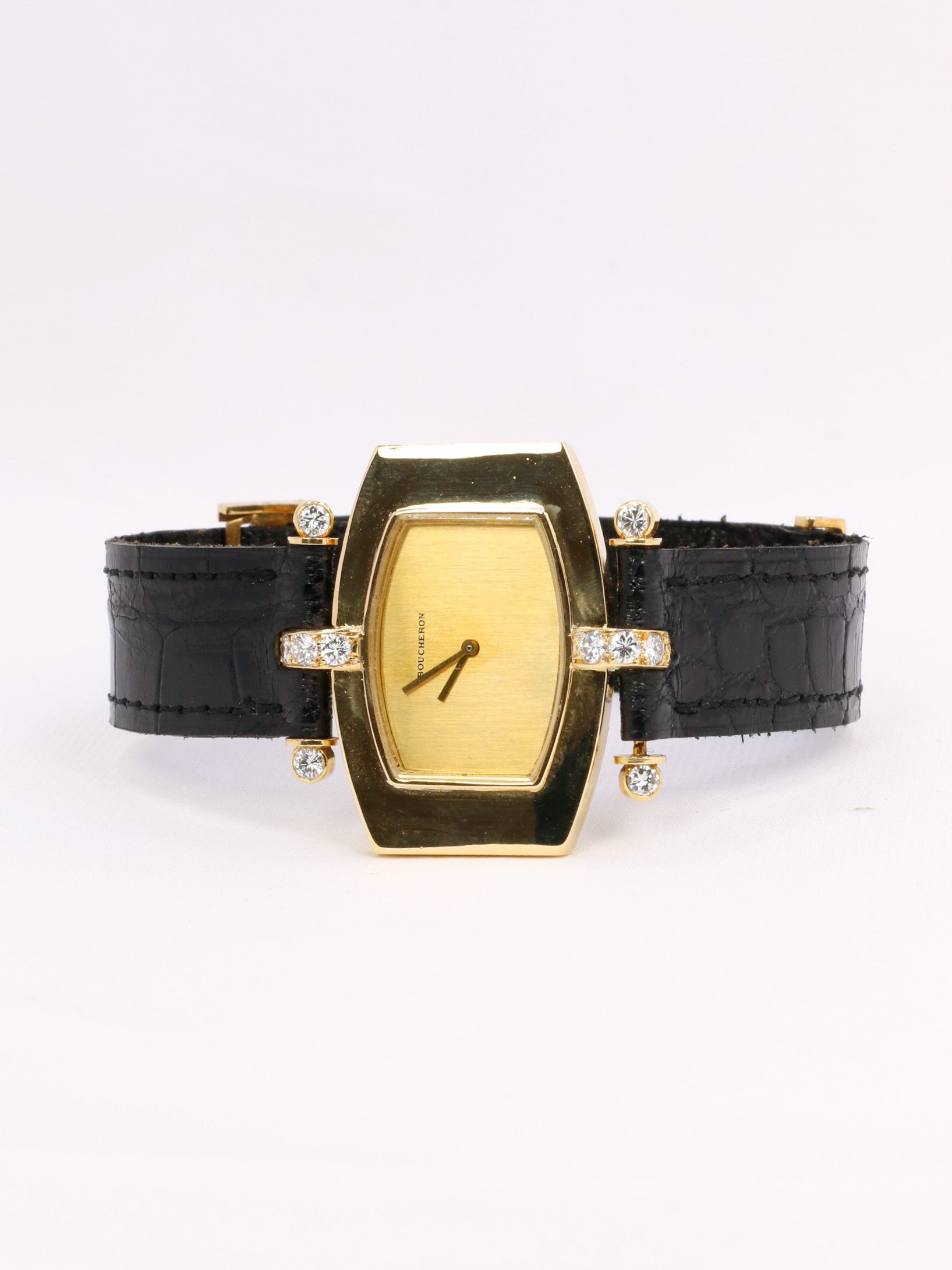 Montre BOUCHERON or jaune diamants cuir noir 1970