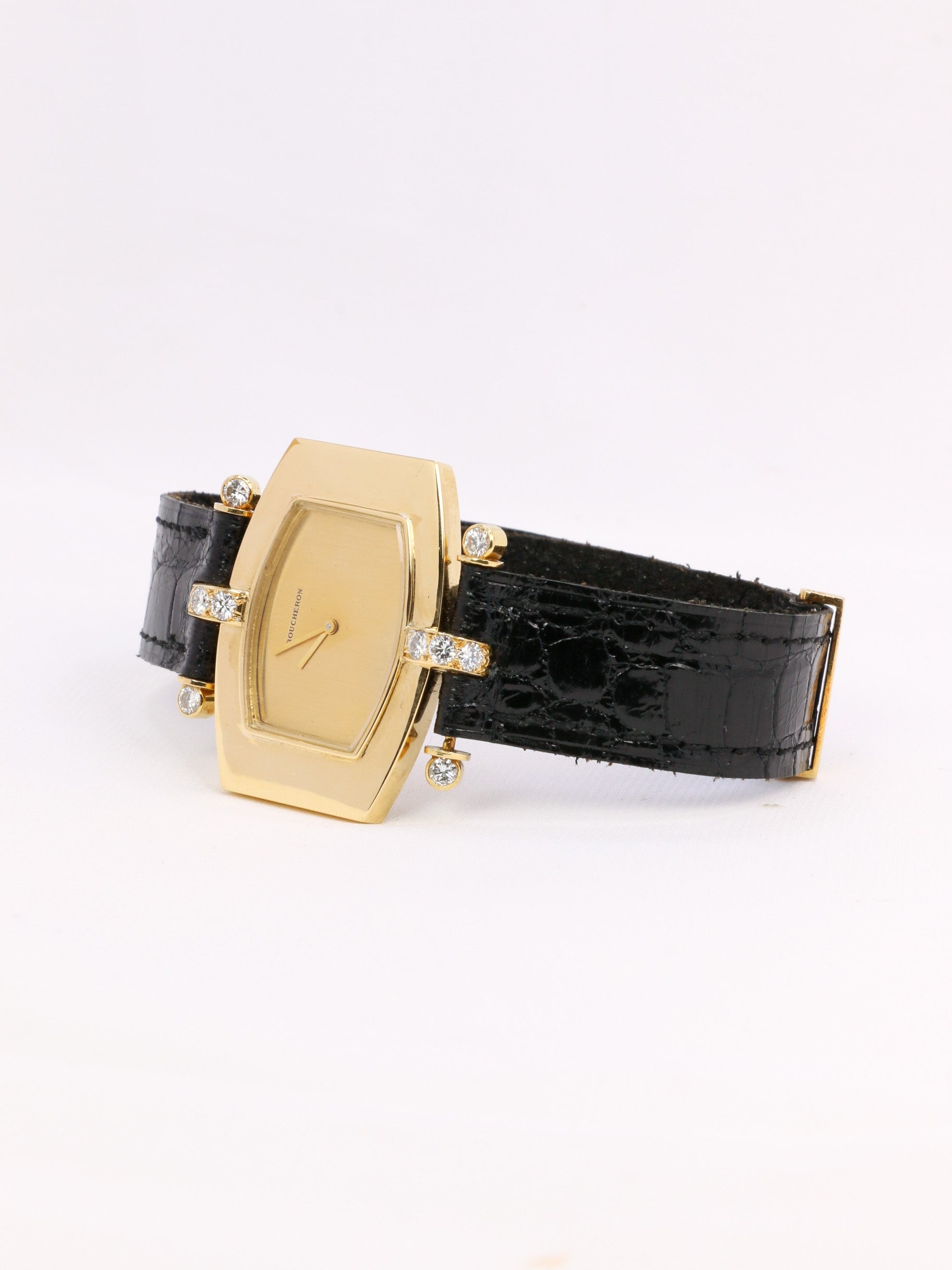 Montre BOUCHERON or jaune diamants cuir noir 1970