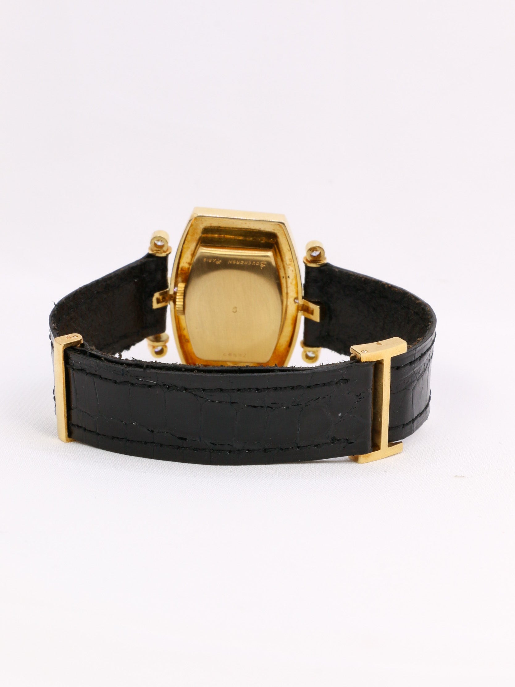 Montre BOUCHERON or jaune diamants cuir noir 1970