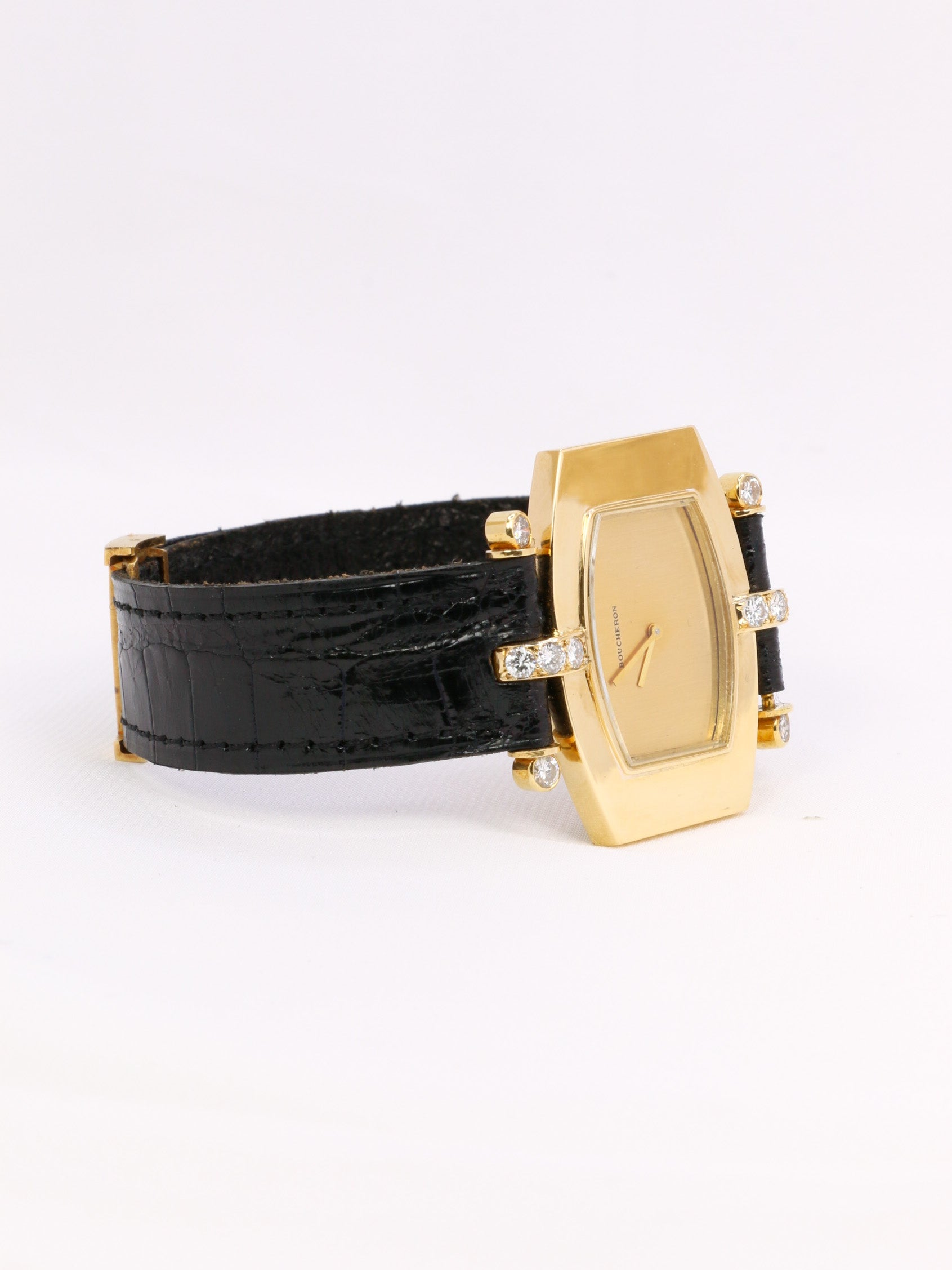 Montre BOUCHERON or jaune diamants cuir noir 1970