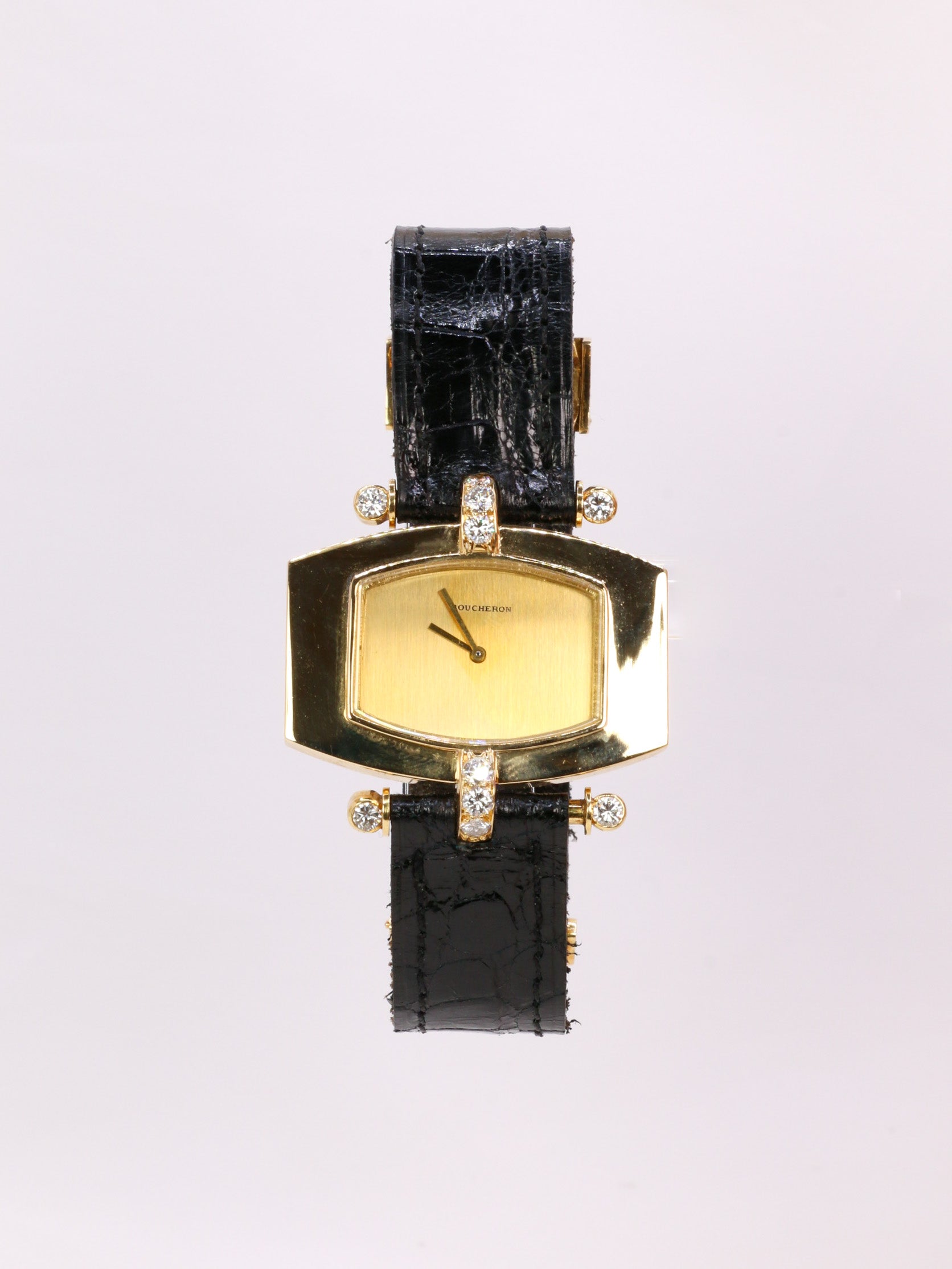 Montre BOUCHERON or jaune diamants cuir noir 1970