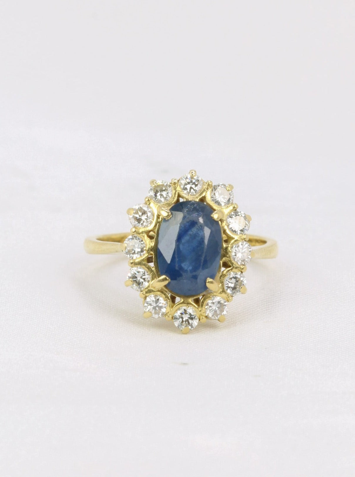 Bague marguerite vintage or diamants saphir ovale