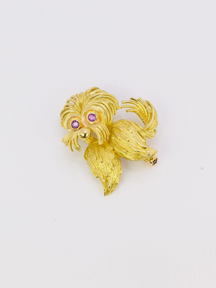 Broche animalière chien or jaune rubis