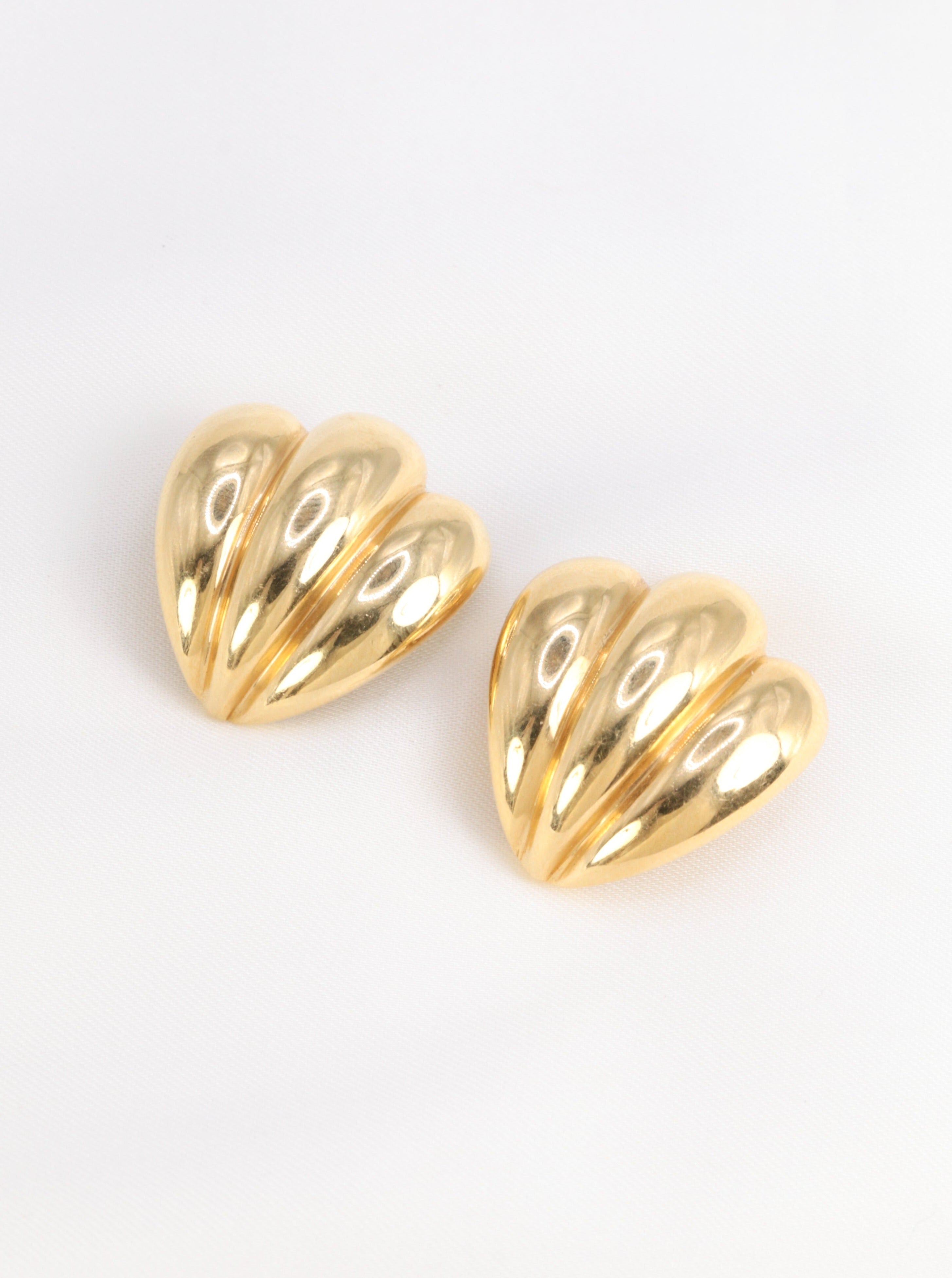 Pair of vintage shell earrings in yellow gold