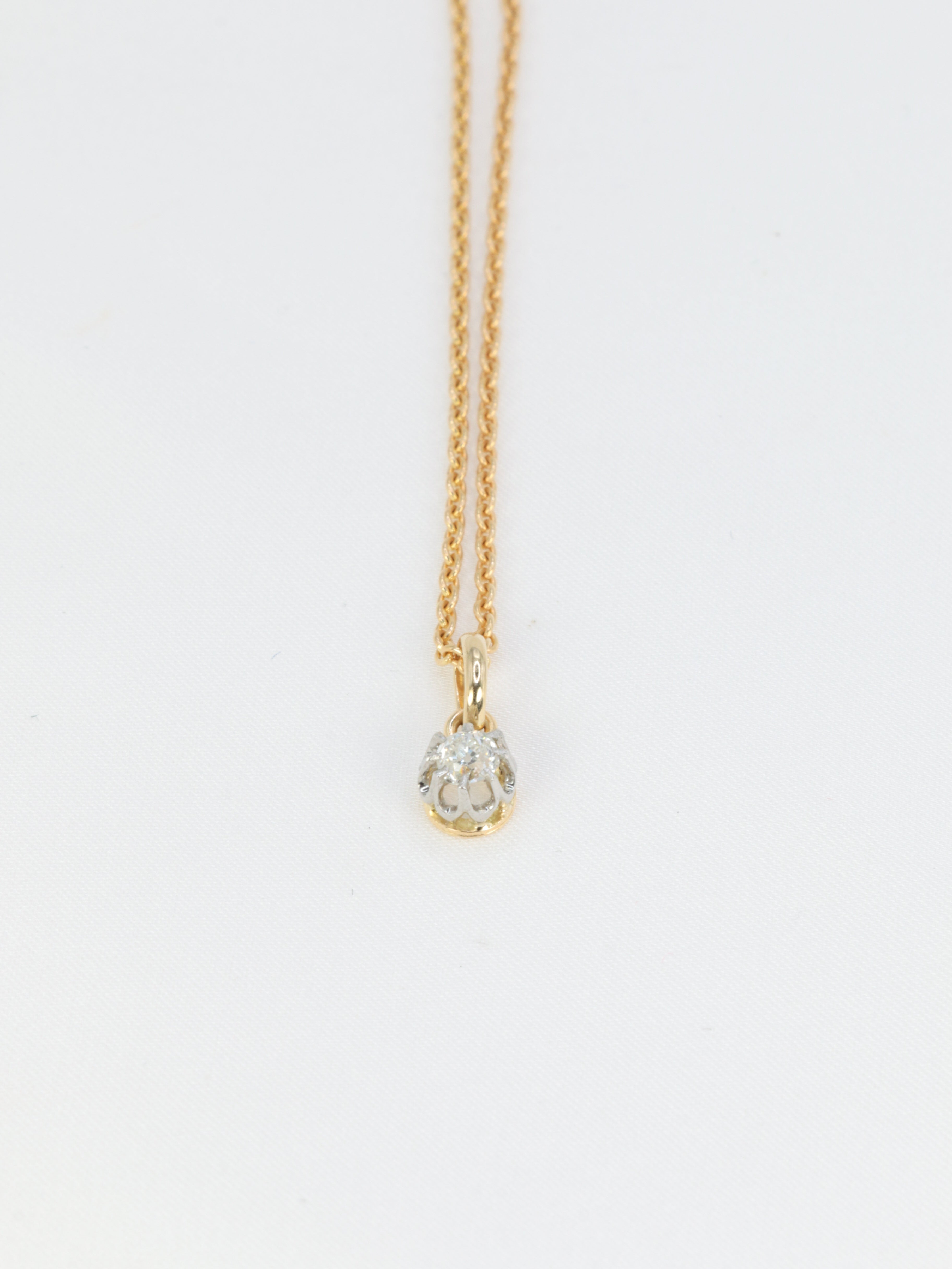 Antique solitaire pendant in gold, silver and old cut diamond 0.2 ct