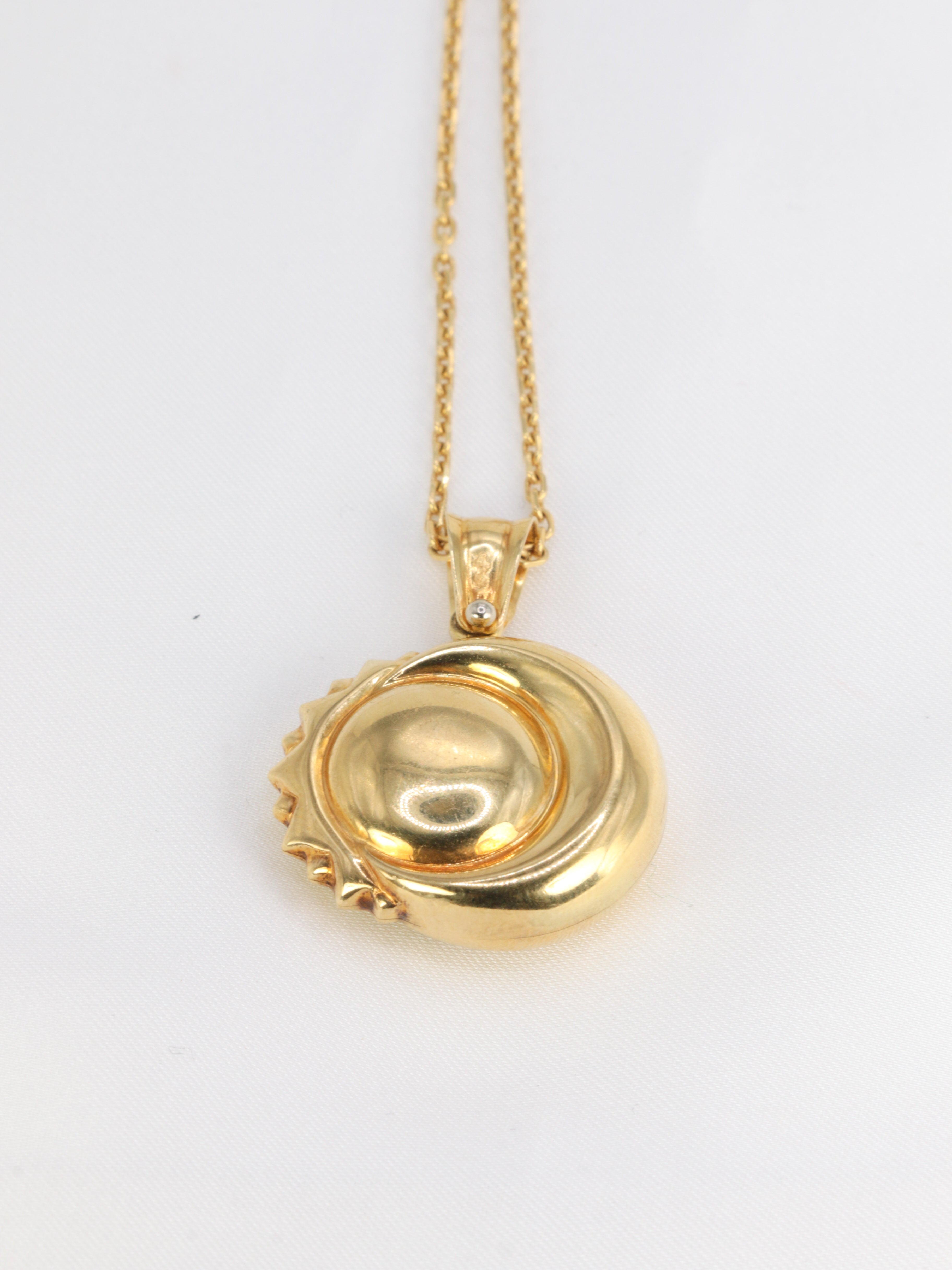 Vintage astral Moon and Sun pendant in yellow gold