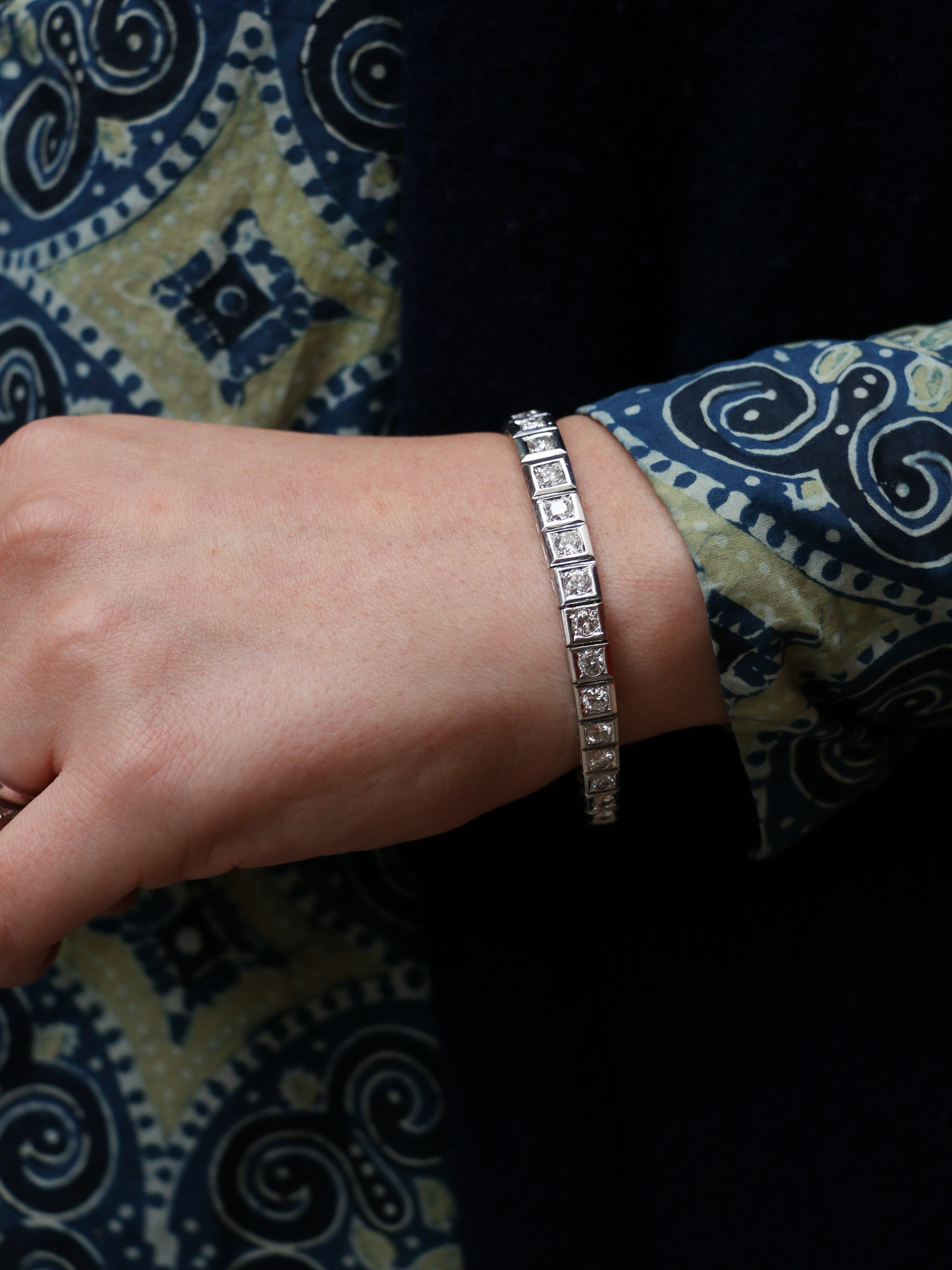 Articulated river bracelet in gold, platinum and diamonds