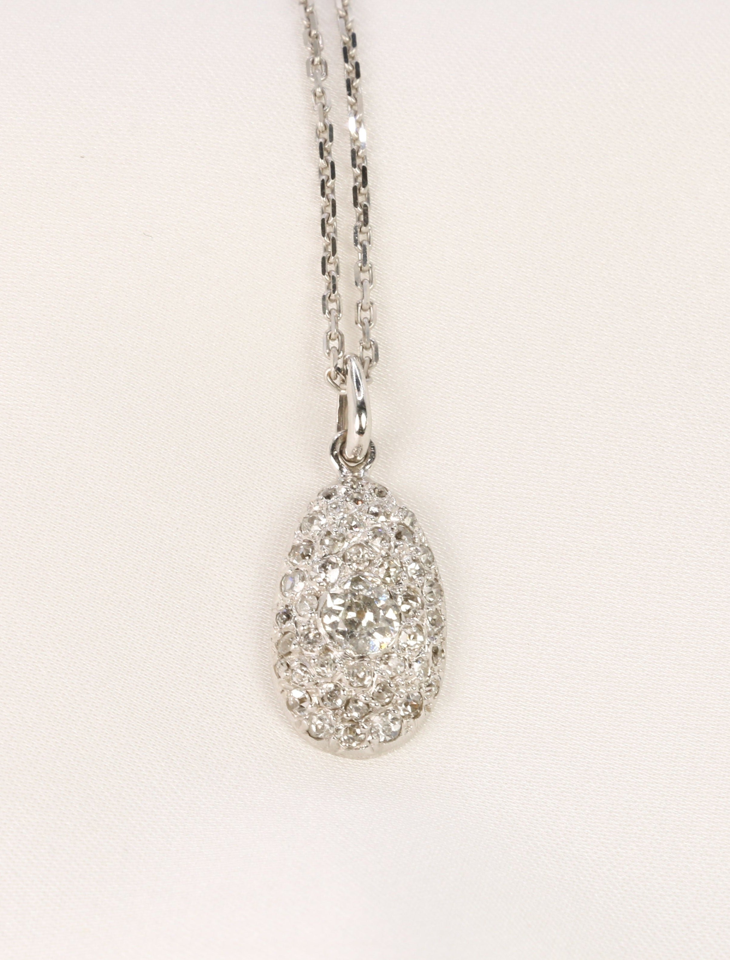 Old ovoid pendant in white gold and old cut diamonds 