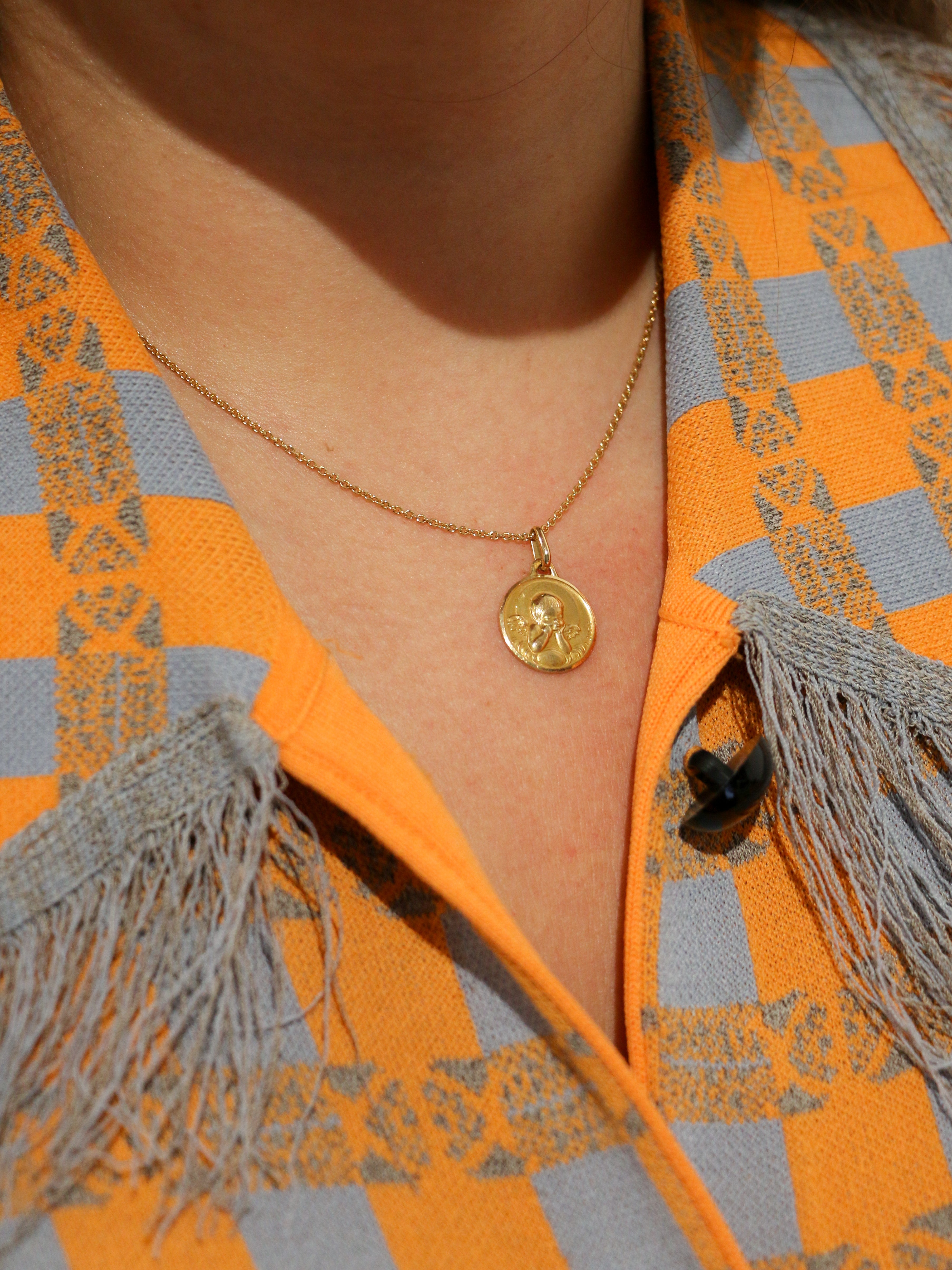 Vintage Augis medal in yellow gold depicting an angel with a quiver