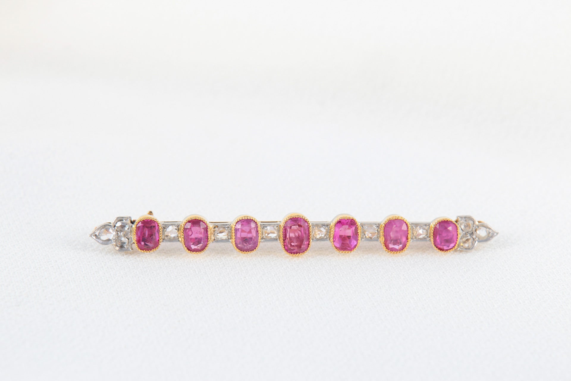 Antique Barrette Brooch in Gold, Diamonds and Pink Sapphires