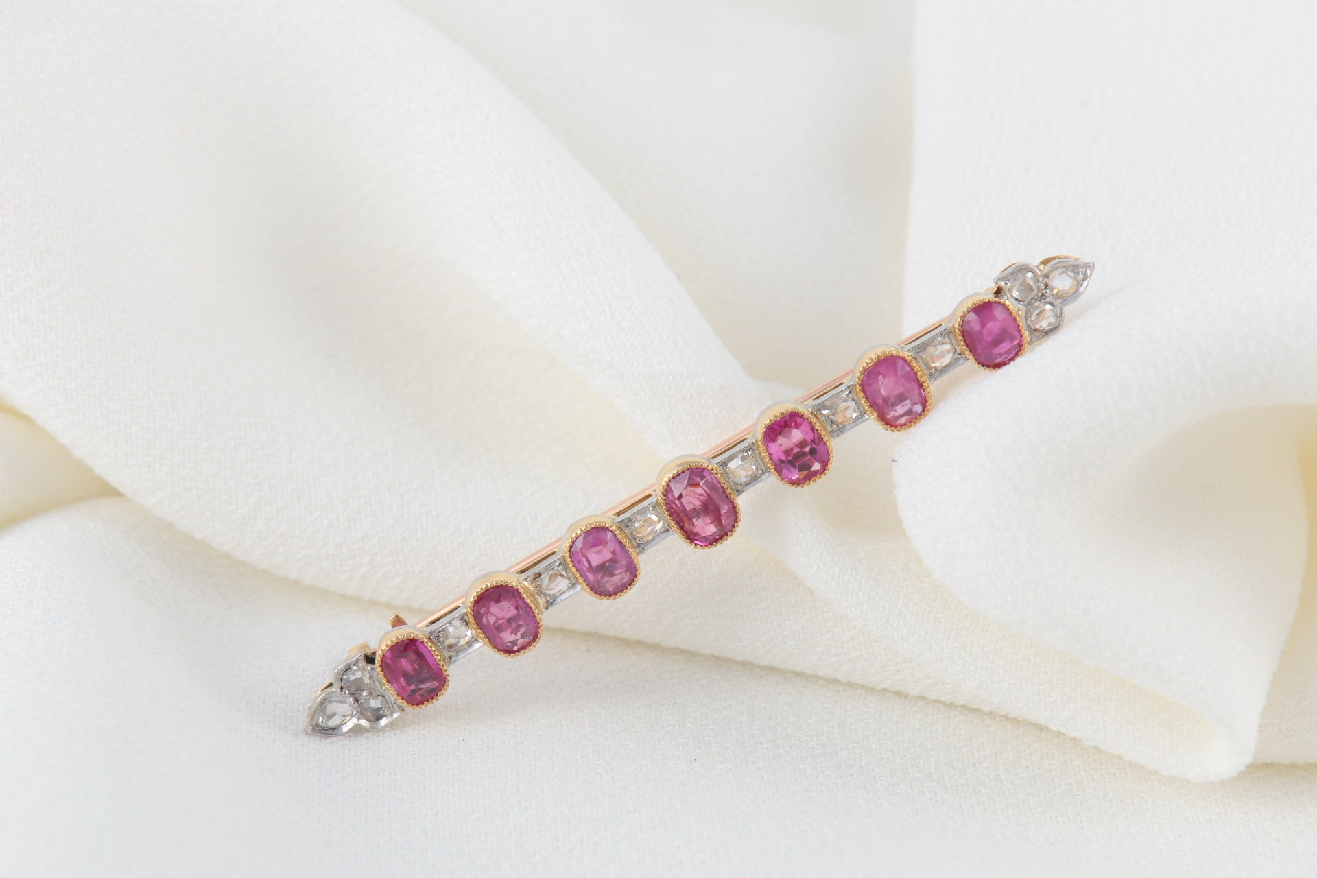 Antique Barrette Brooch in Gold, Diamonds and Pink Sapphires