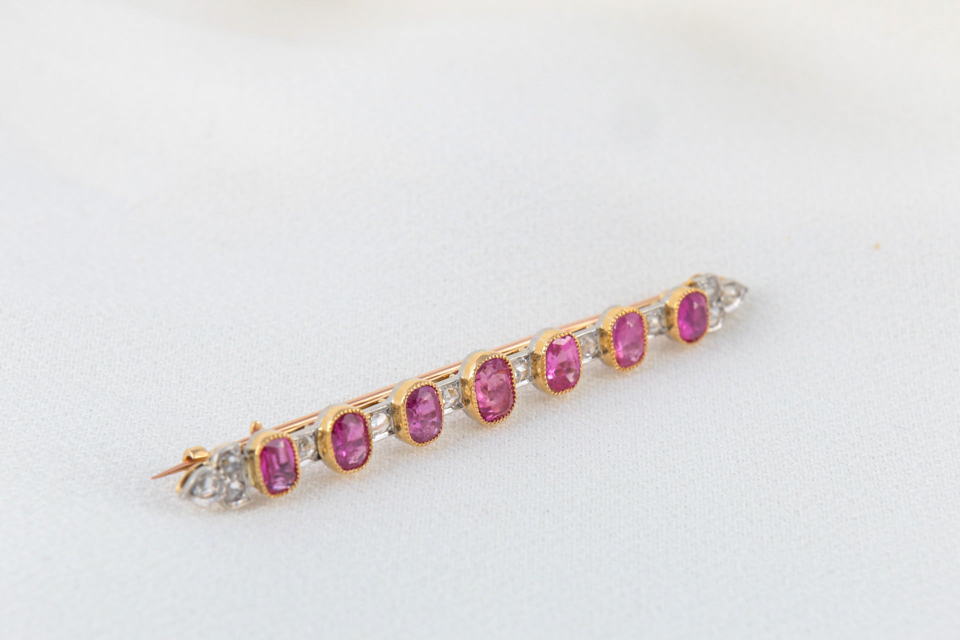 Antique Barrette Brooch in Gold, Diamonds and Pink Sapphires