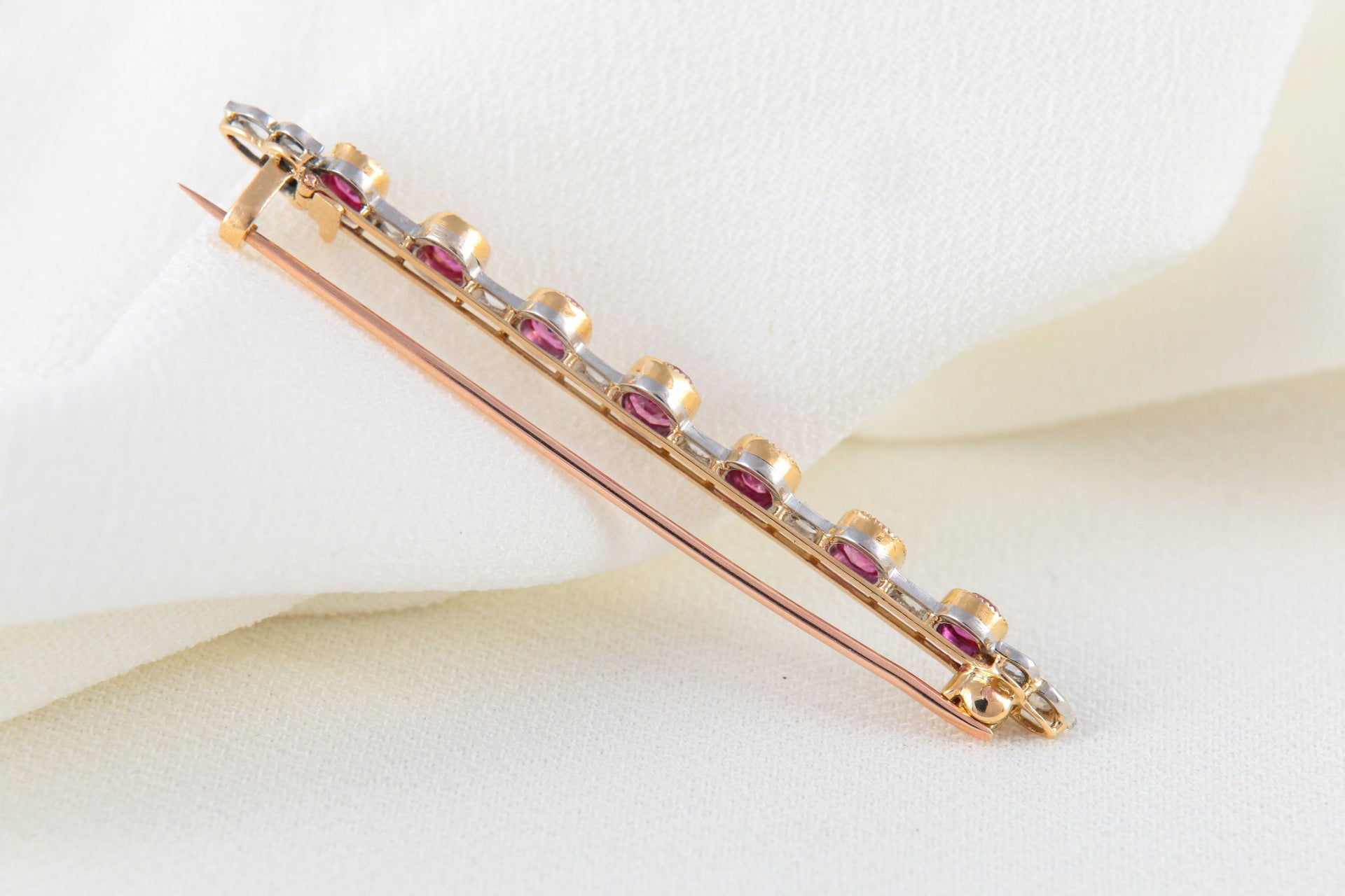 Antique Barrette Brooch in Gold, Diamonds and Pink Sapphires