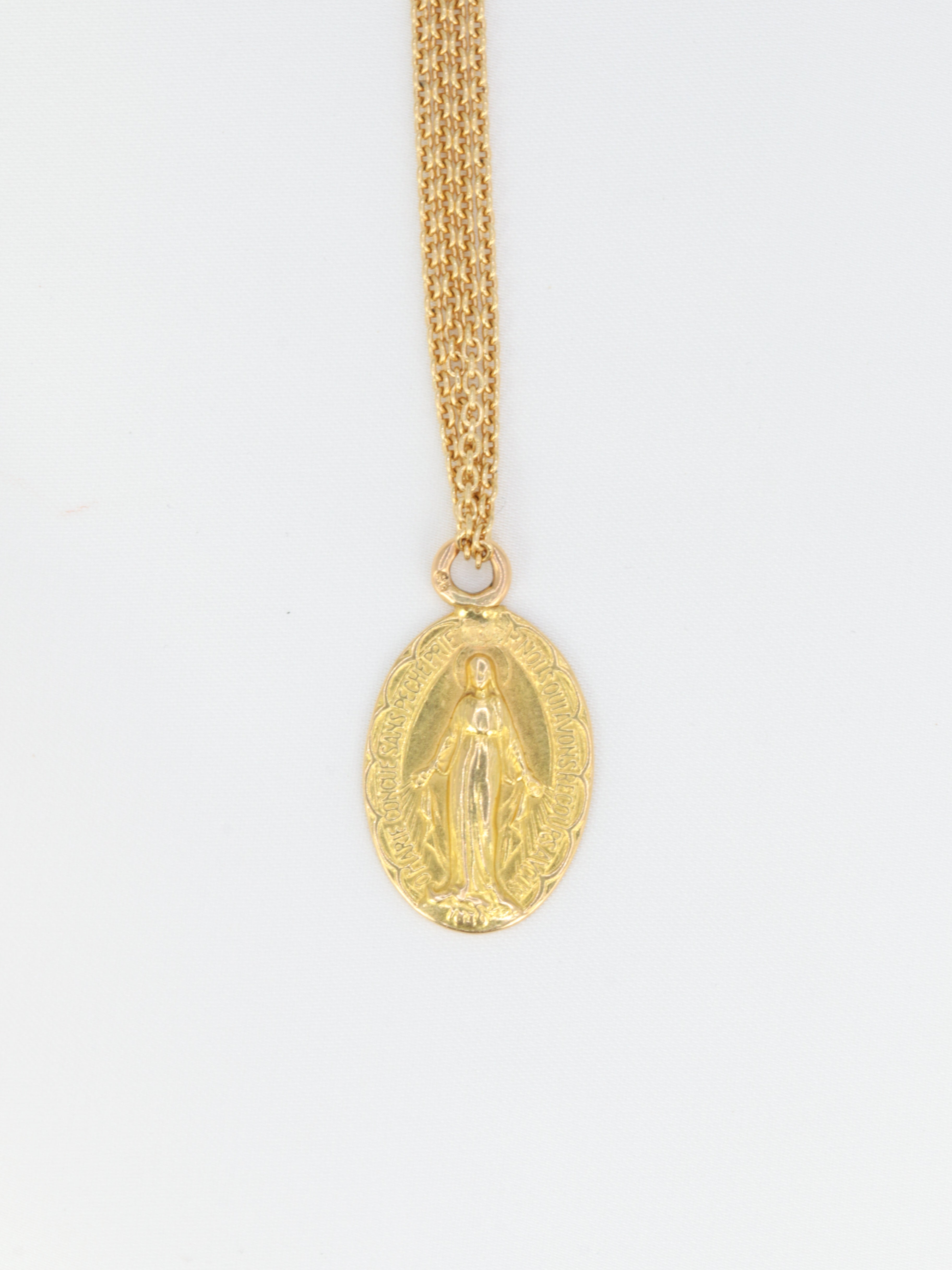 1930 medal depicting a miraculous virgin in gold