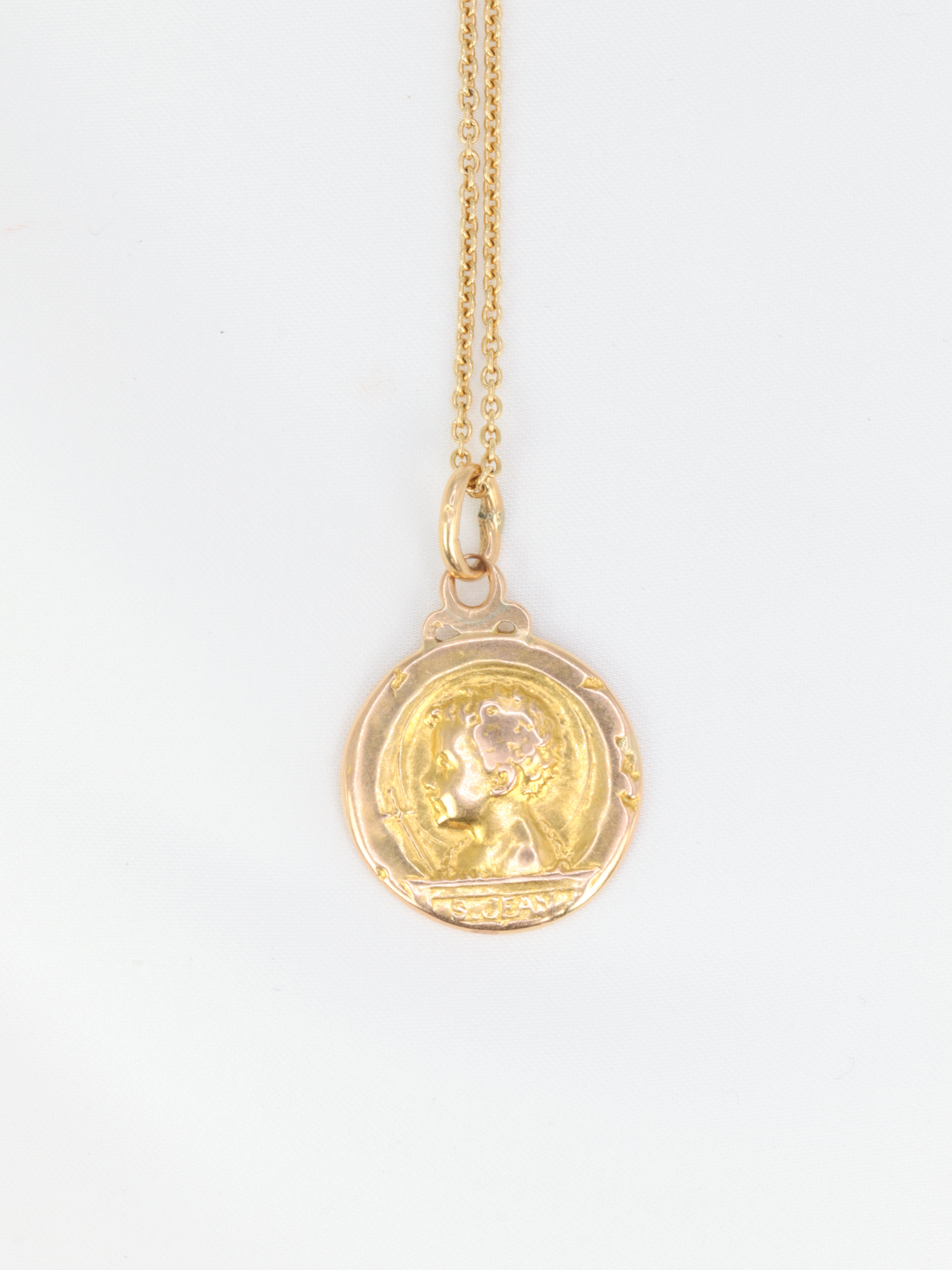 Art Nouveau medal depicting Saint John and the lamb in yellow gold