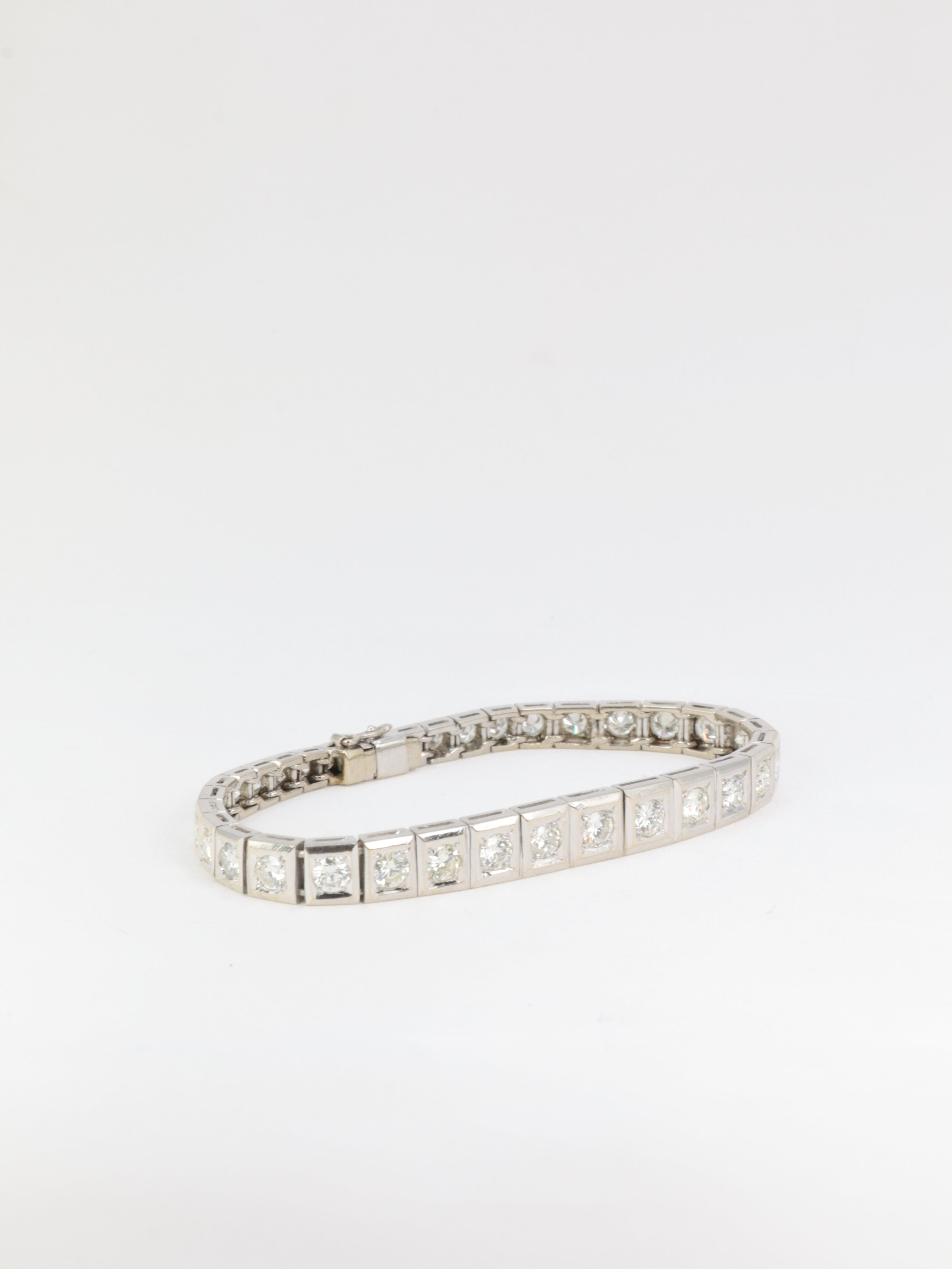 Articulated river bracelet in gold, platinum and diamonds