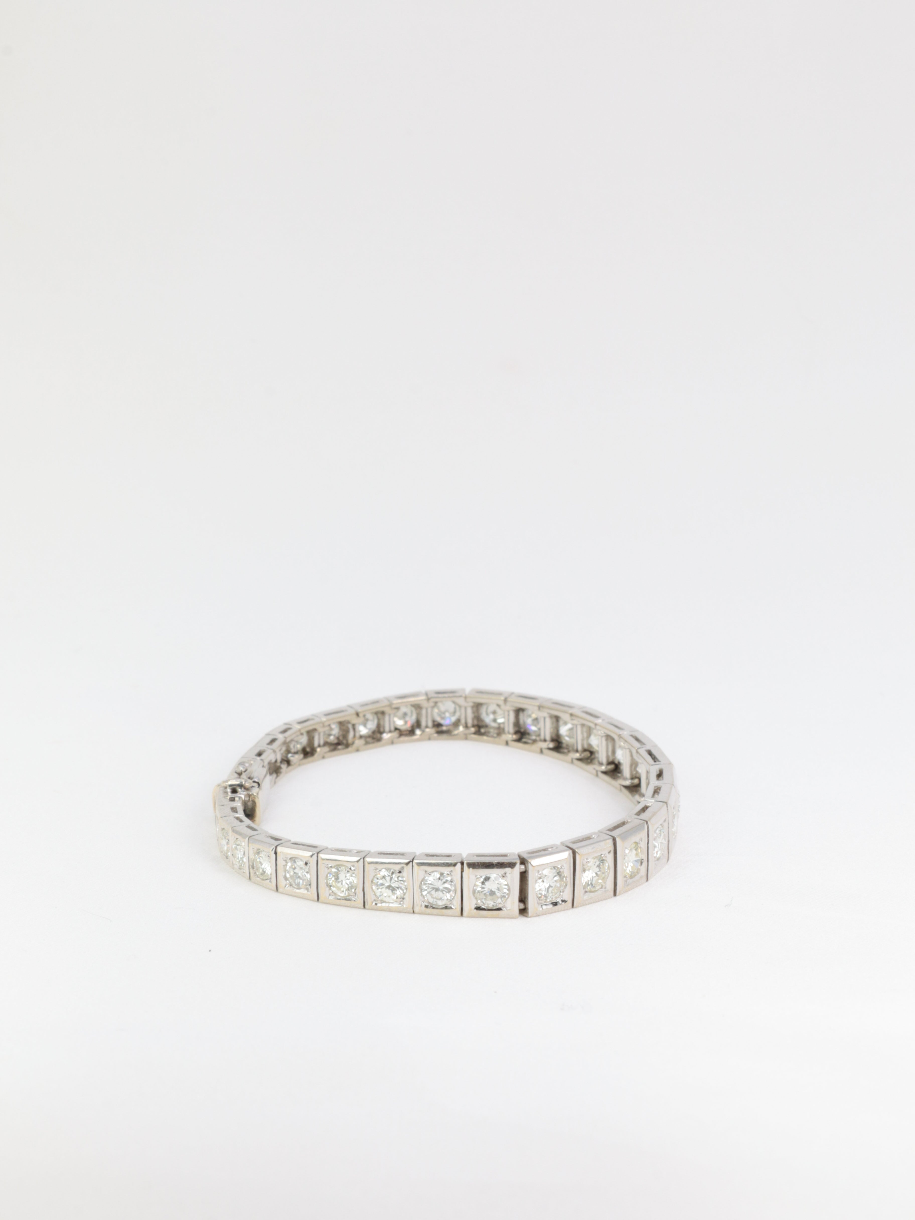 Articulated river bracelet in gold, platinum and diamonds