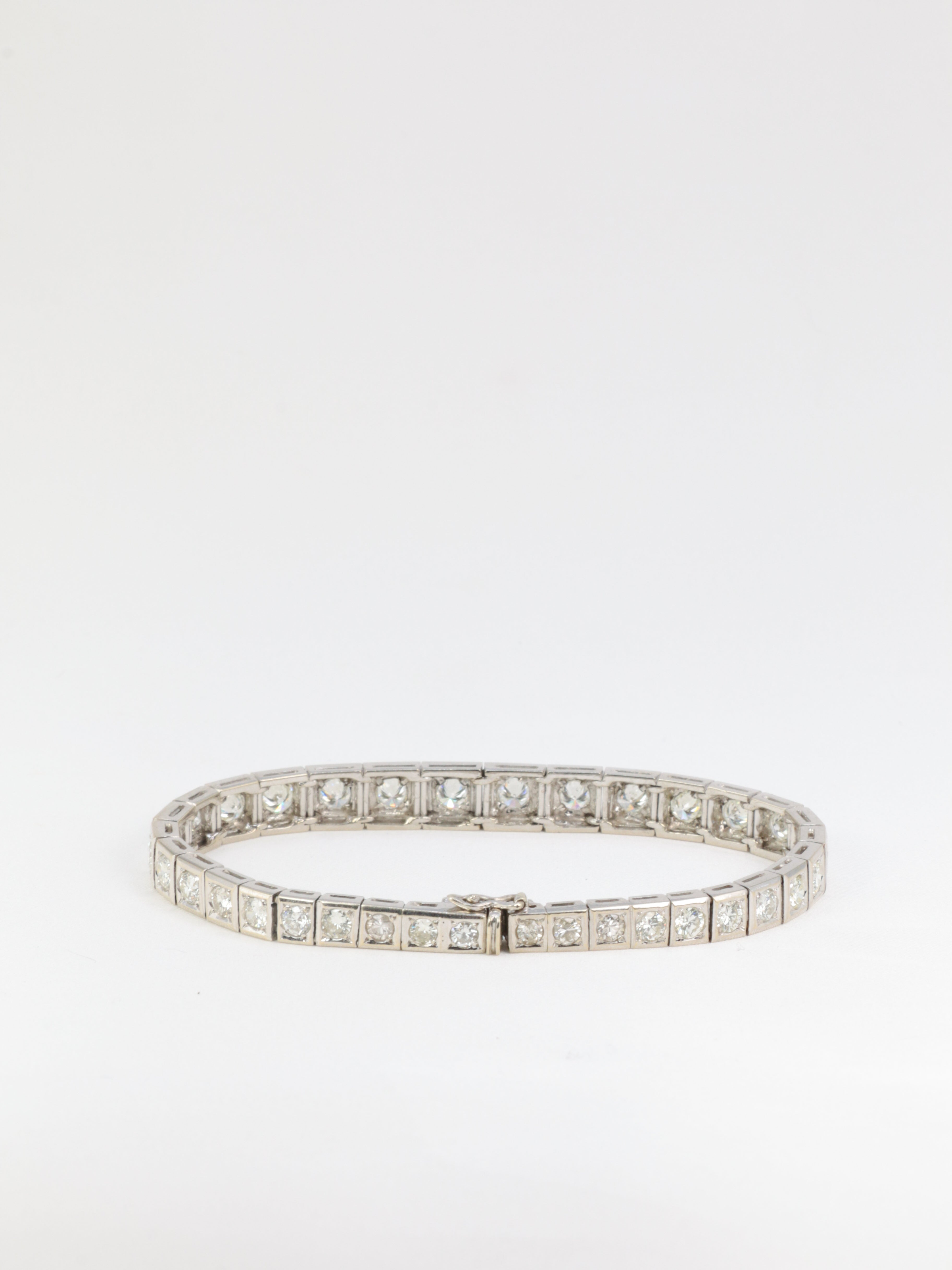 Articulated river bracelet in gold, platinum and diamonds