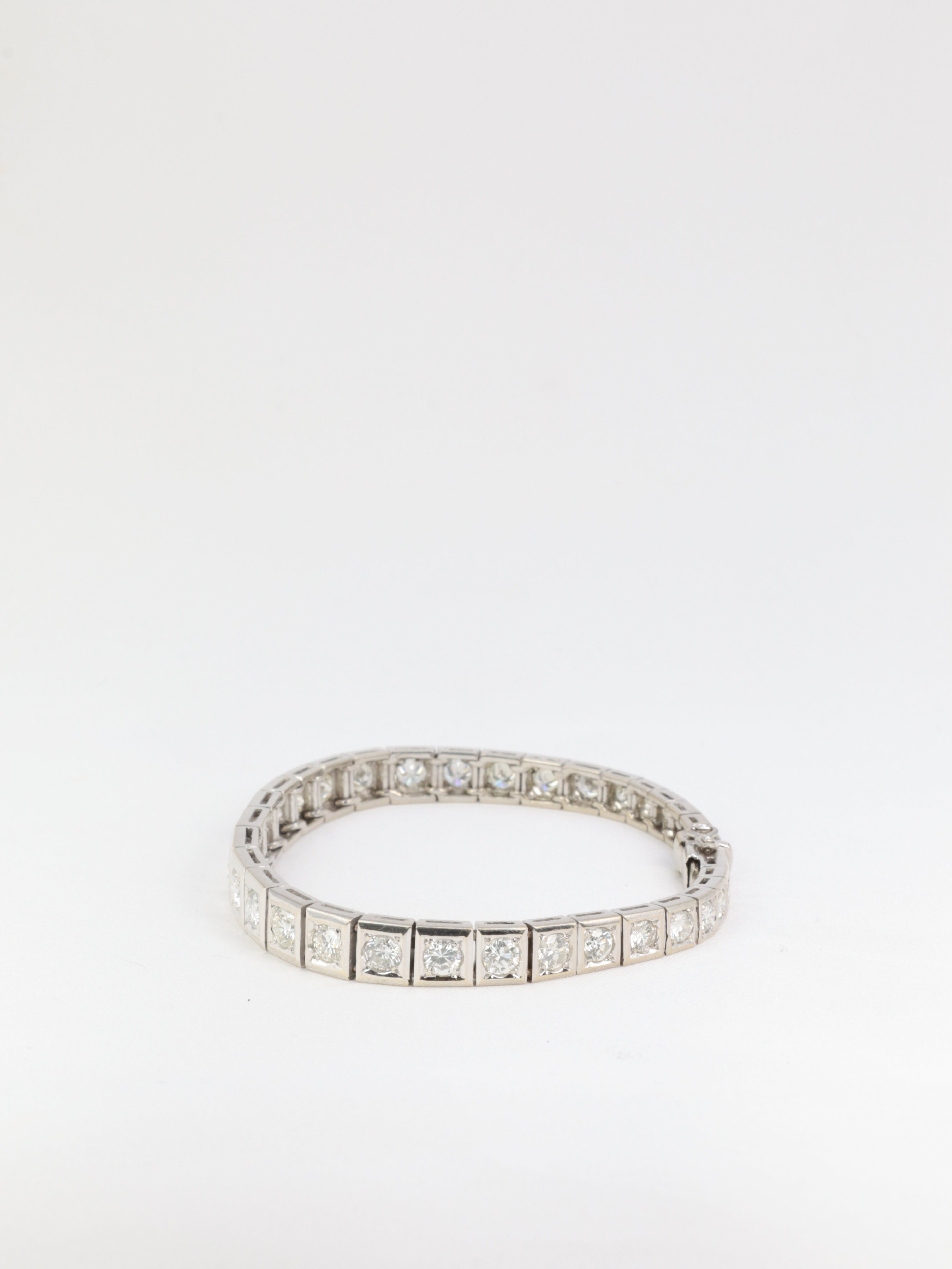 Articulated river bracelet in gold, platinum and diamonds