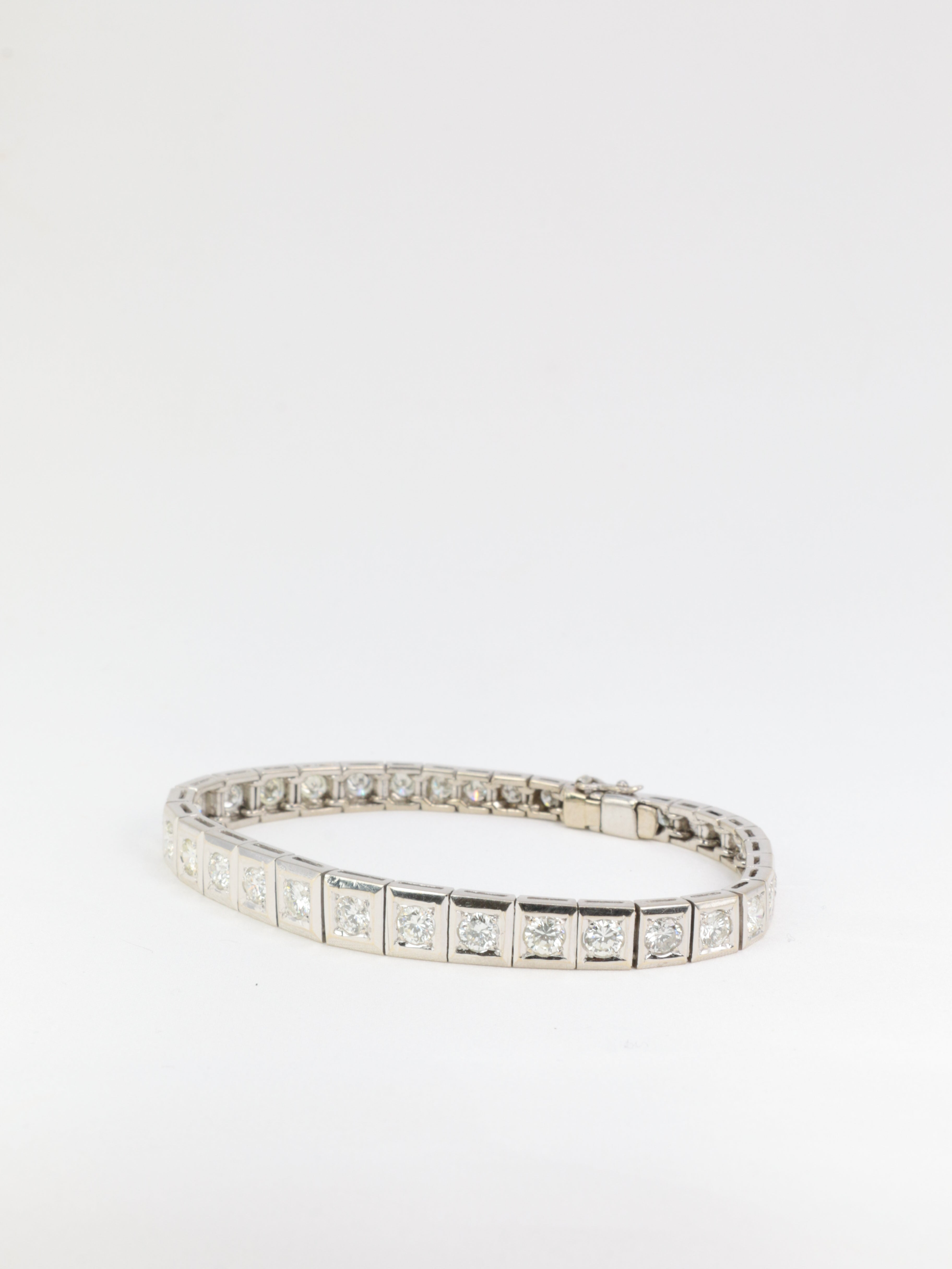 Articulated river bracelet in gold, platinum and diamonds